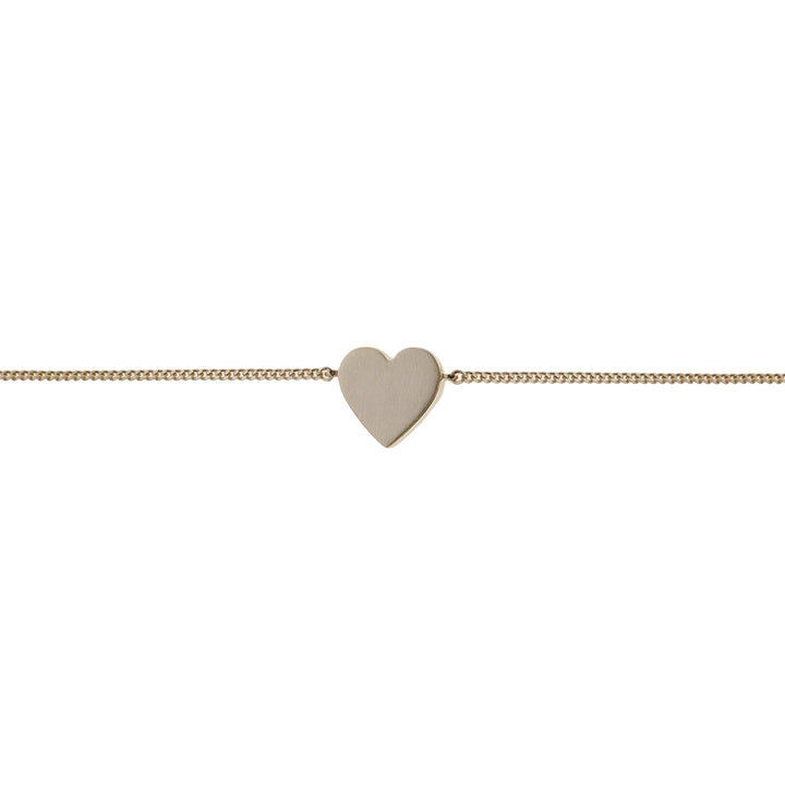 Gold Spirit bracelet by Tutti &amp; Co featuring a delicate, minimalist design, displayed on a neutral background.