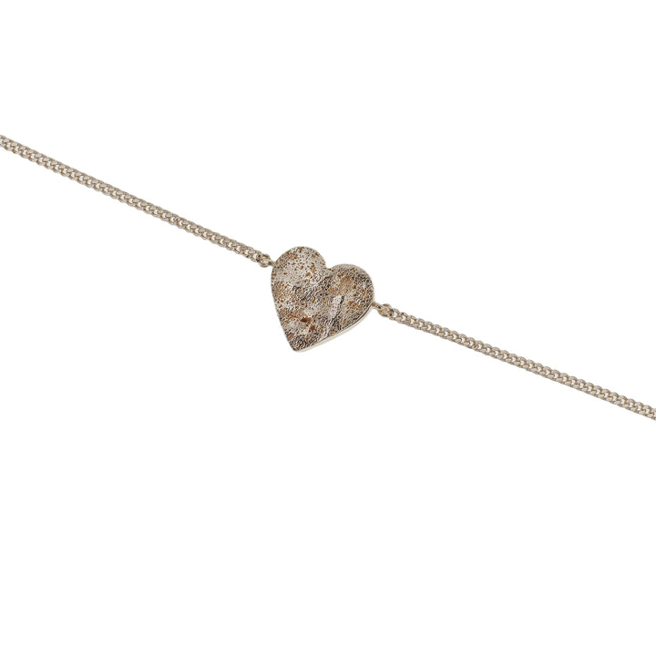 Gold Spirit Bracelet by Tutti &amp; Co featuring intricate design, displayed on a neutral background.