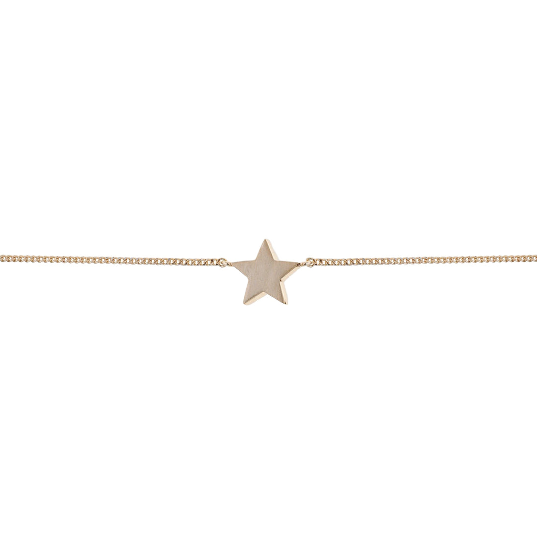 Gold Cosma bracelet by Tutti &amp; Co featuring delicate chain links and minimalist design, showcased on a neutral background.
