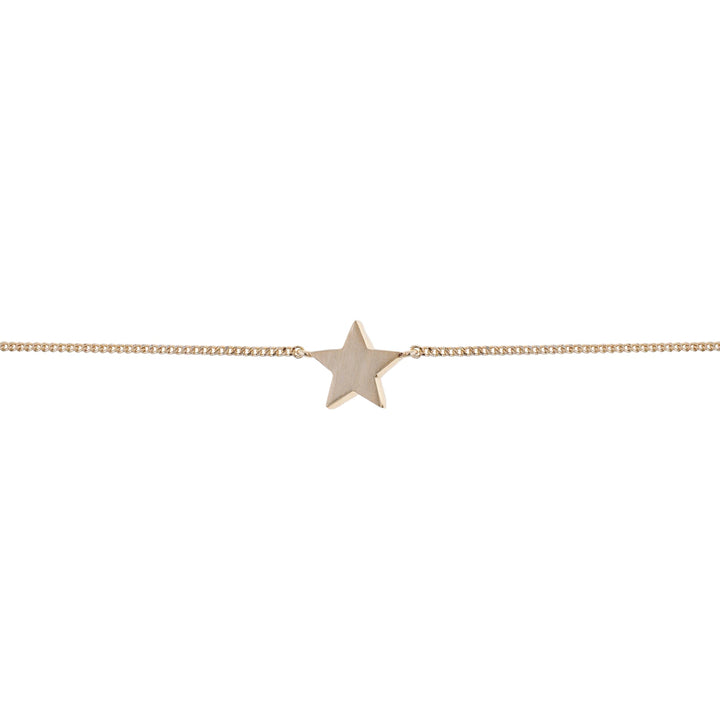 Gold Cosma bracelet by Tutti &amp; Co featuring delicate chain links and minimalist design, showcased on a neutral background.