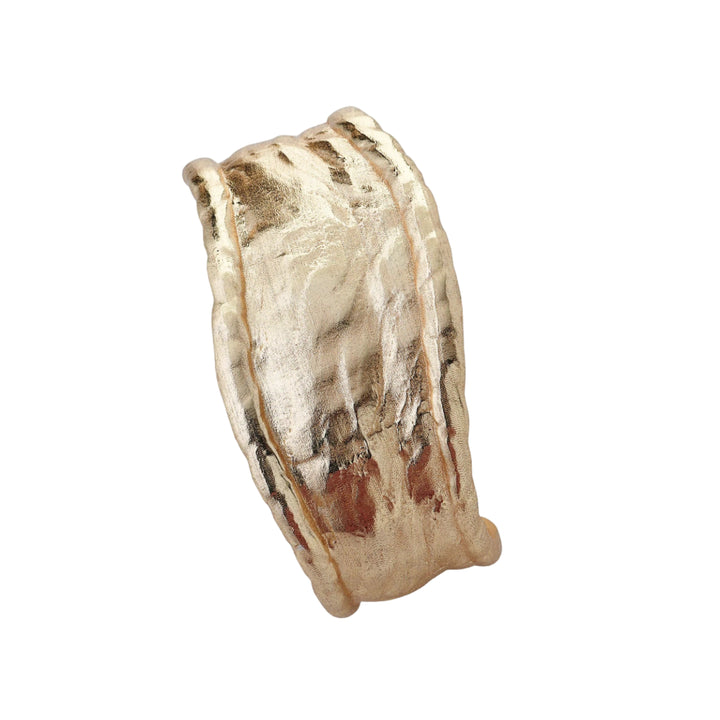 Gold Arc Cuff Bracelet by Tutti &amp; Co featuring a sleek, minimalist design on a neutral background.