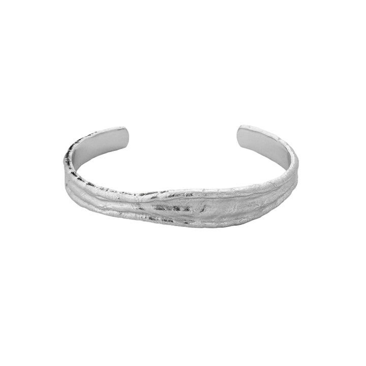 Silver Driftline Bangle by Tutti &amp; Co featuring a sleek, modern design, displayed on a neutral background.
