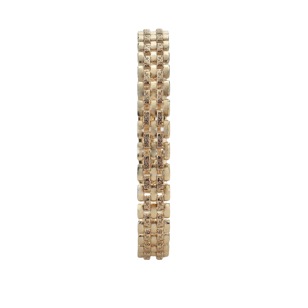 Gold Form Bangle by Tutti &amp; Co, featuring a sleek, modern design with a polished finish, displayed on a neutral background.