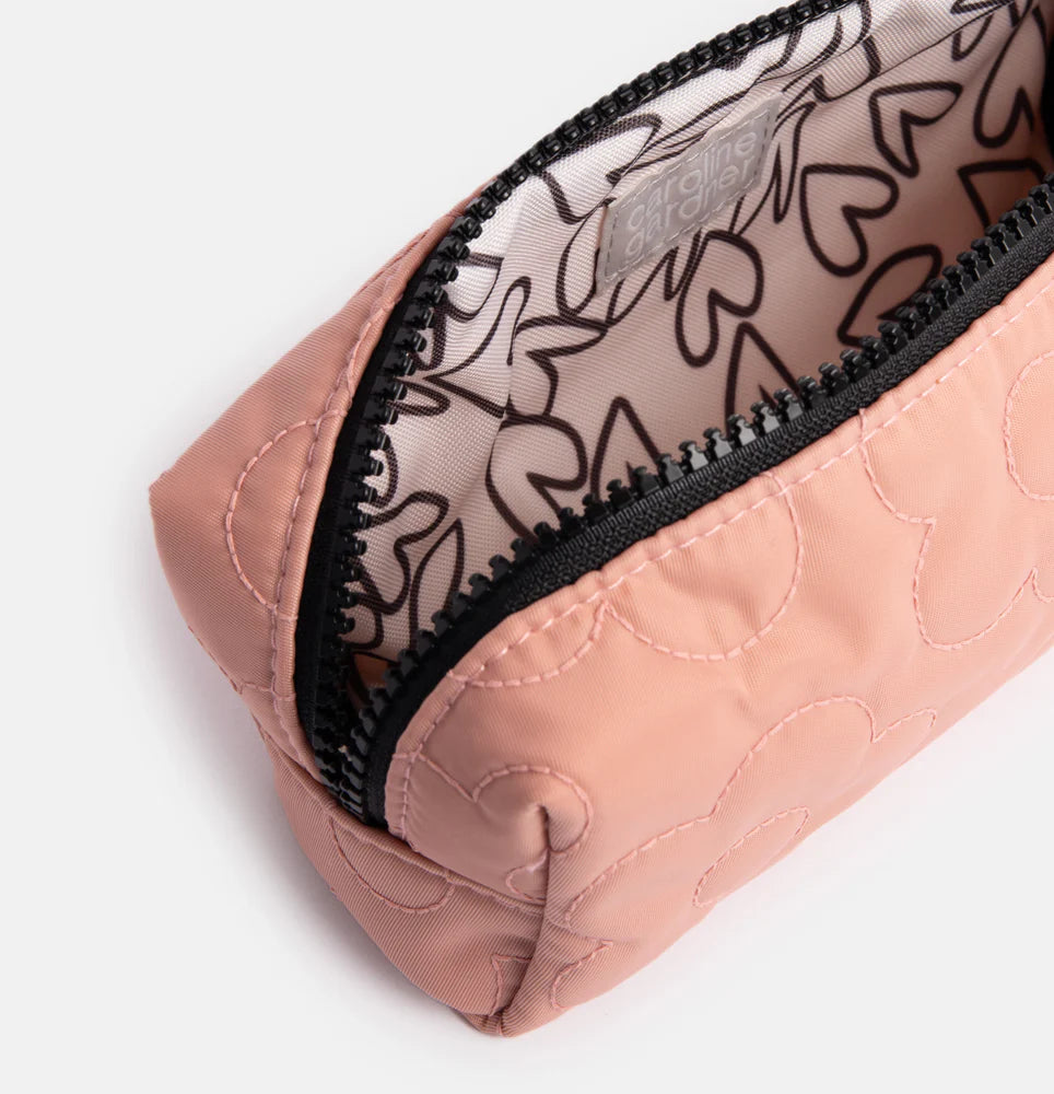 Pink flower quilted cube case by Caroline Gardner, designed for organizing essentials with floral pattern and soft fabric.