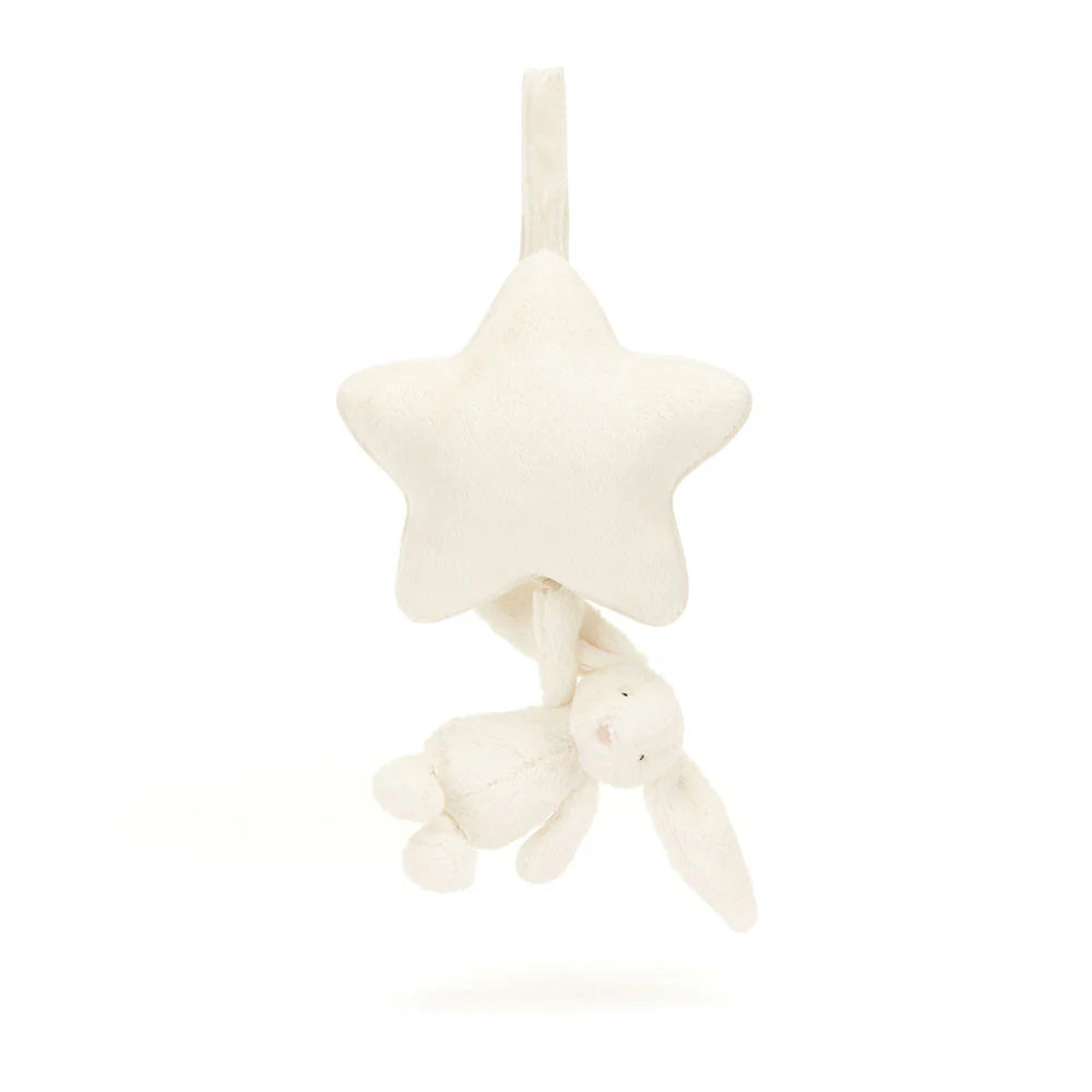 Cream-colored Jellycat Bashful Bunny musical pull toy with floppy ears and soft plush texture, designed for infants.