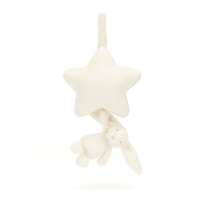 Cream-colored Jellycat Bashful Bunny musical pull toy with floppy ears and soft plush texture, designed for infants.
