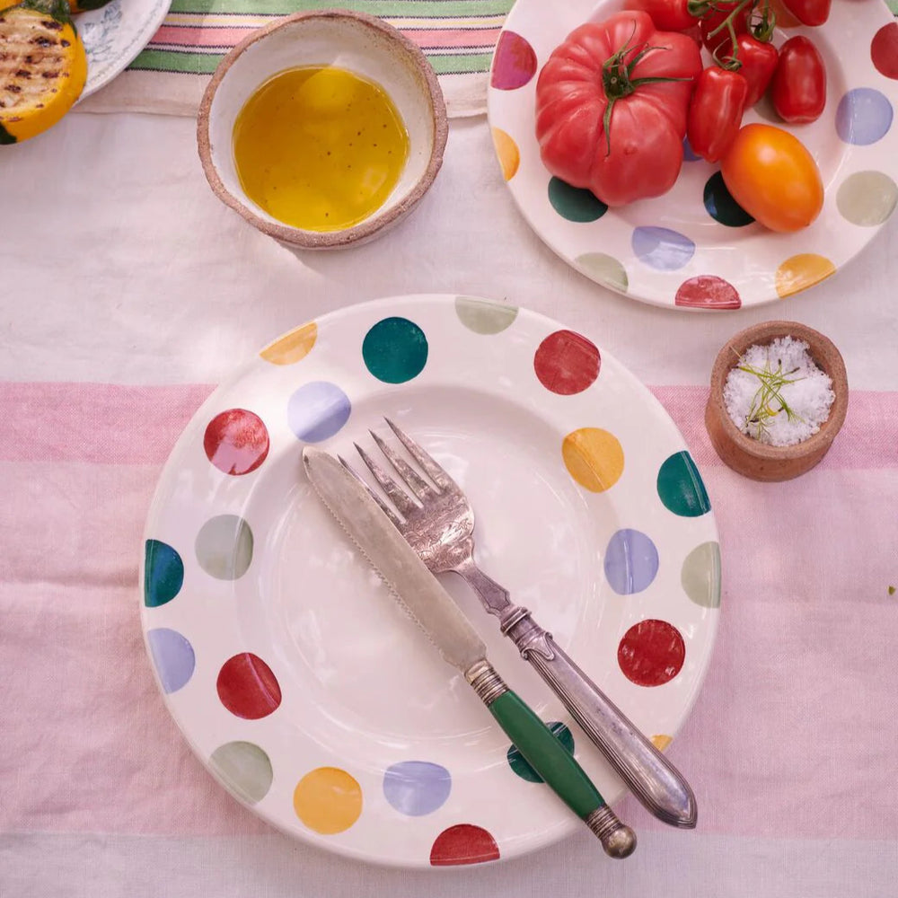 Emma Bridgewater Big Polka Dots 10½-inch dinner plate with colorful polka dot design on white ceramic.
