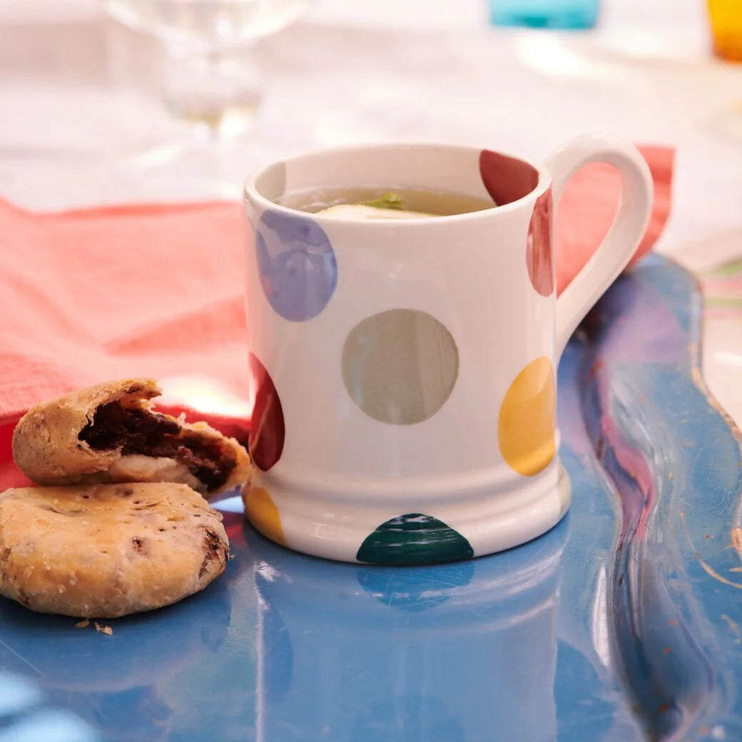 Emma Bridgewater Big Polka Dots ½ Pint Mug with black and white polka dot pattern on ceramic mug.