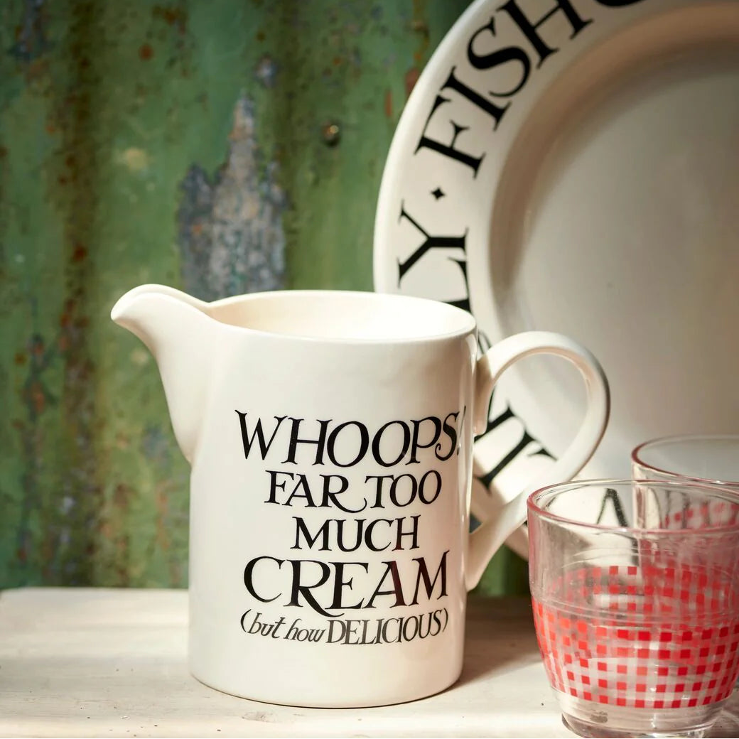 Emma Bridgewater Black Toast cream medium straight jug with black toast pattern on cream ceramic, ideal for serving or decor.