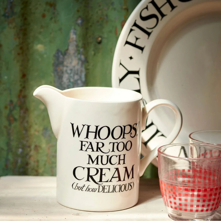 Emma Bridgewater Black Toast cream medium straight jug with black toast pattern on cream ceramic, ideal for serving or decor.