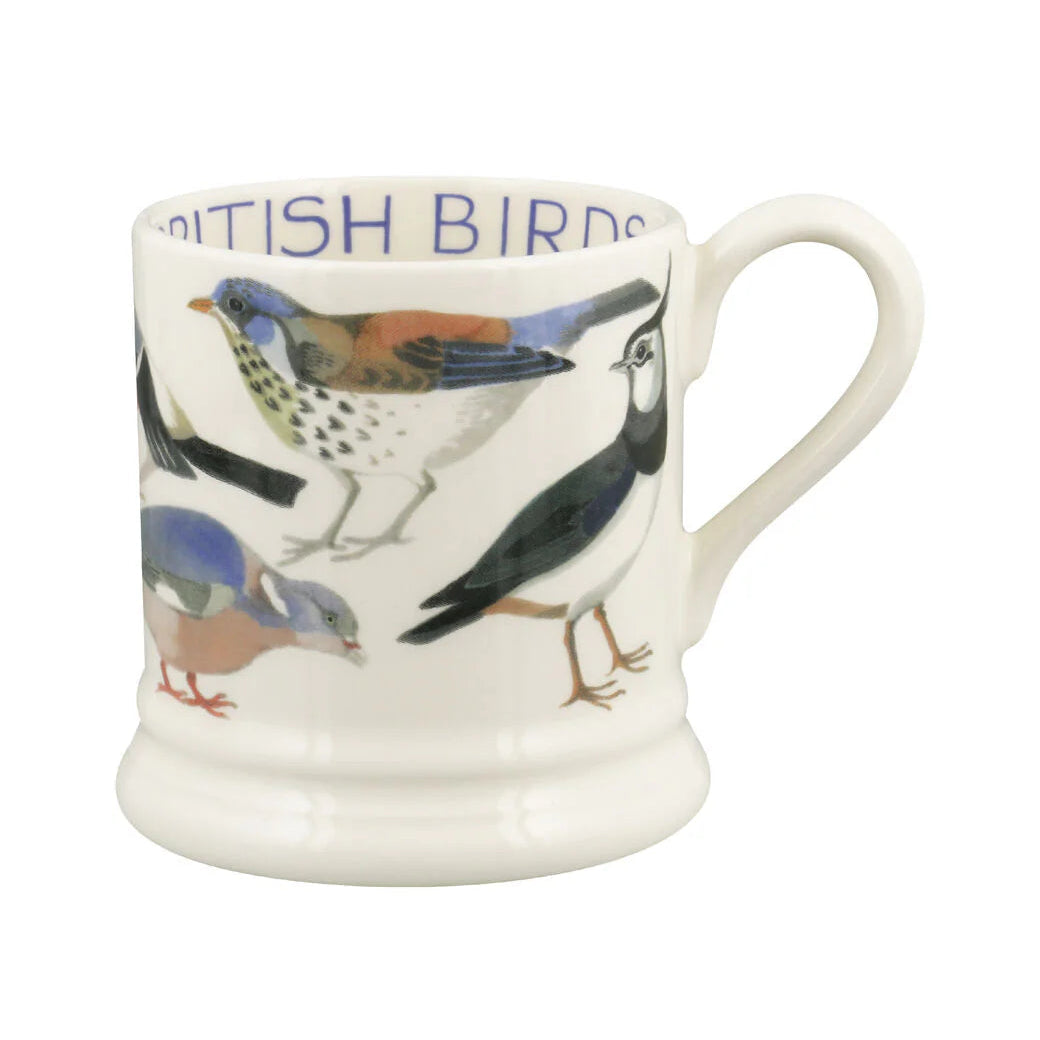 A white ceramic mug featuring a detailed illustration of various British birds and the text 'BRITISH BIRDS' printed inside the rim, set against a plain white background.