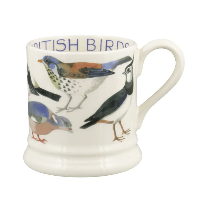 A white ceramic mug featuring a detailed illustration of various British birds and the text &