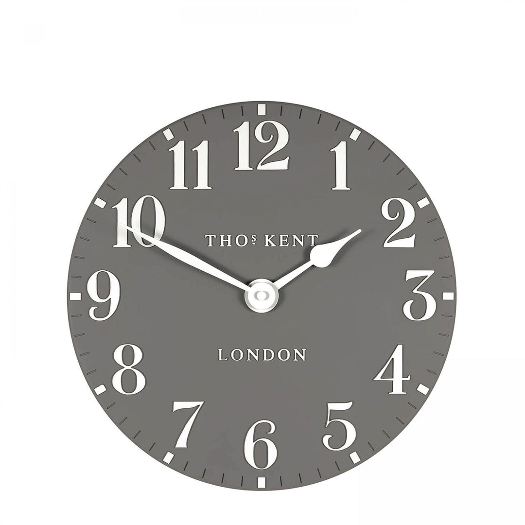 12-inch Arabic wall clock with dolphin design by Cornucopia Home and Gift, featuring artistic Arabic numerals on a decorative clock face.