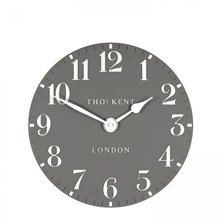 12-inch Arabic wall clock with dolphin design by Cornucopia Home and Gift, featuring artistic Arabic numerals on a decorative clock face.