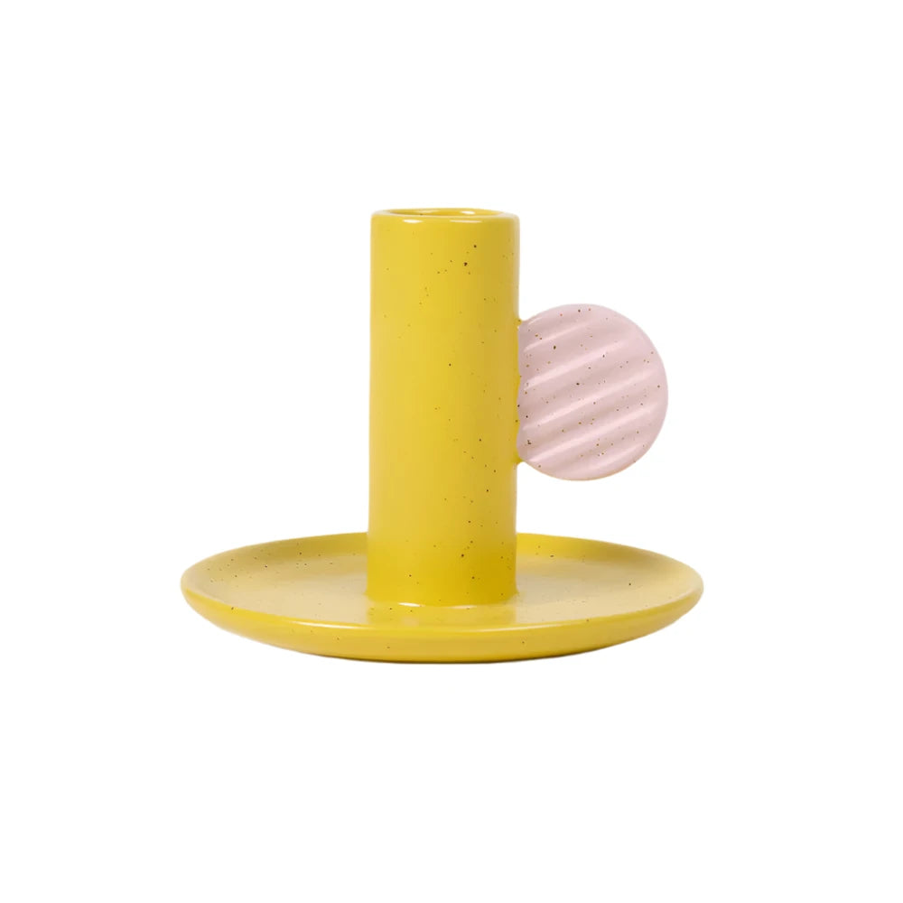 Mustard yellow Caroline Gardner candle holder with a sleek, modern design, perfect for home decor and gift-giving.