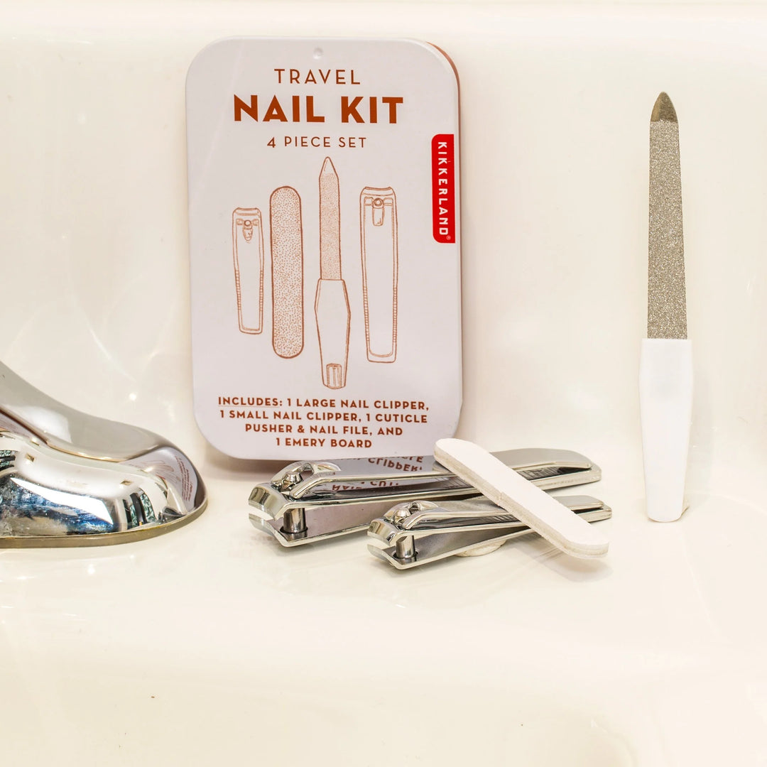 Kikkerland Travel Nail Kit with compact case, nail clippers, scissors, and grooming tools for on-the-go personal care.