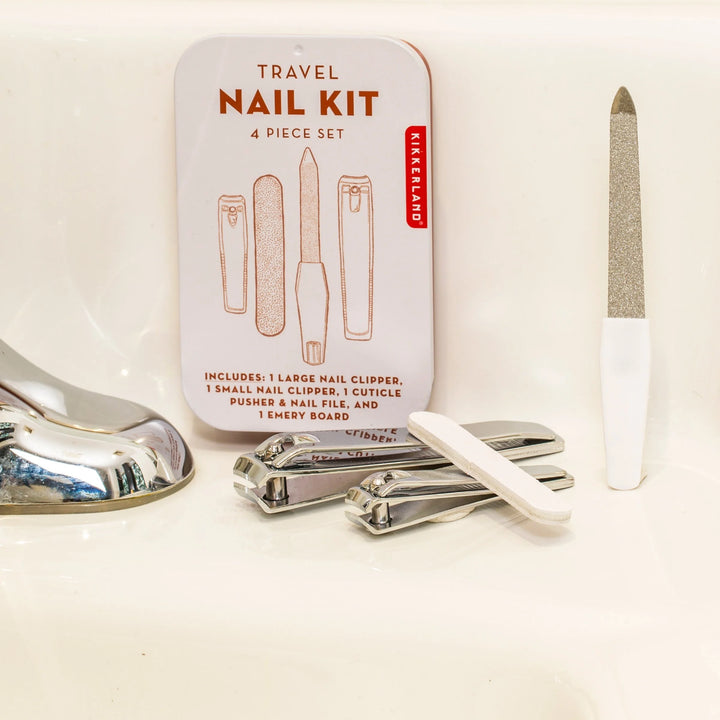 Kikkerland Travel Nail Kit with compact case, nail clippers, scissors, and grooming tools for on-the-go personal care.