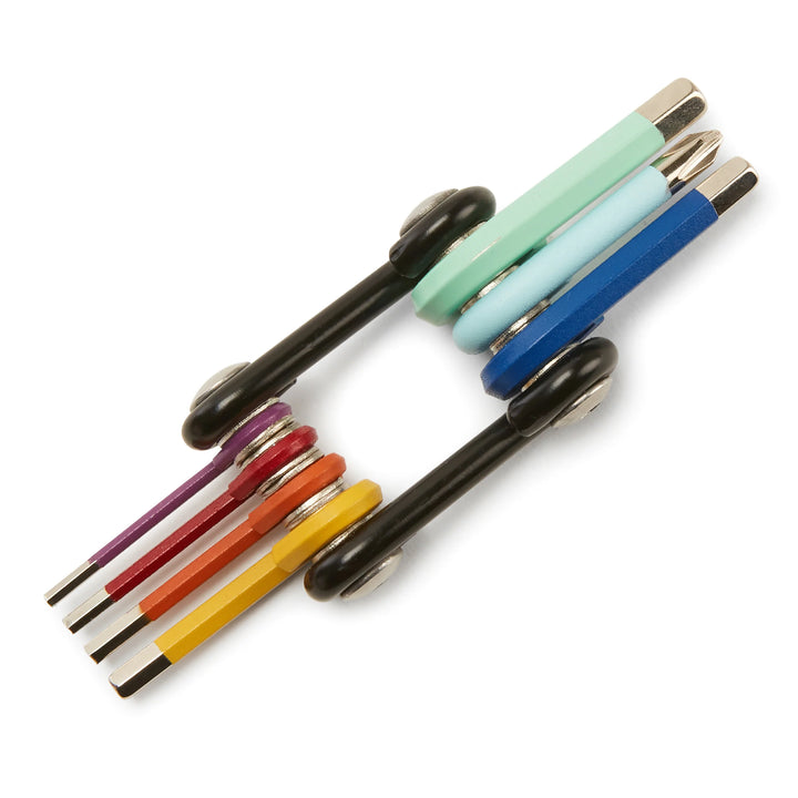 Rainbow 7-in-1 multi-tool by Kikkerland featuring colorful handles and multiple functions for versatile use.