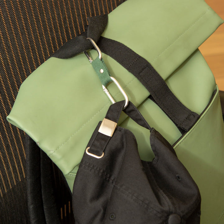 Kikkerland Dual-Clip Buddy by Cornucopia Home and Gift, a playful desk accessory with two clips and colorful design.
