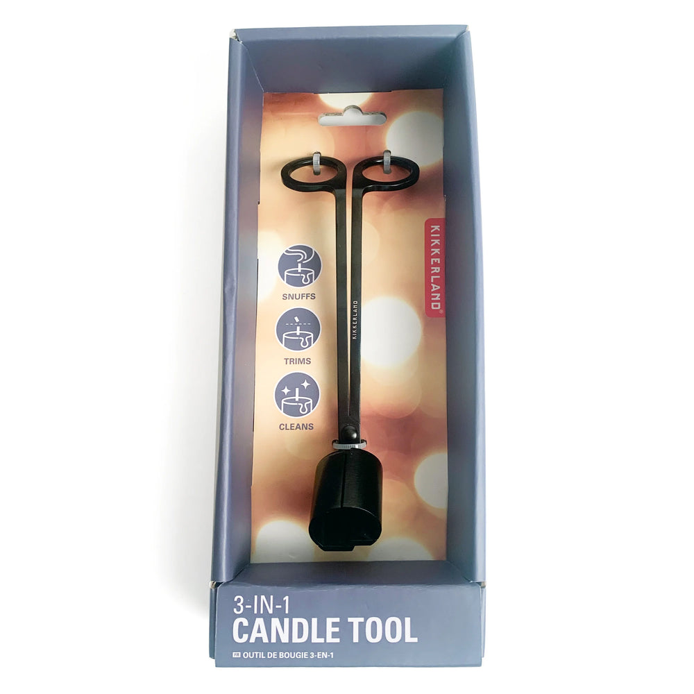 Kikkerland 3-in-1 candle tool with wick trimmer, snuffer, and holder, in sleek metal design for easy candle maintenance.