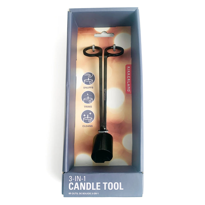 Kikkerland 3-in-1 candle tool with wick trimmer, snuffer, and holder, in sleek metal design for easy candle maintenance.