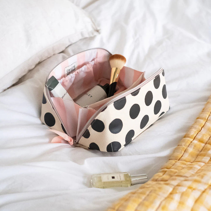 Caroline Gardner large diagonal washbag with scattered dot pattern, perfect for travel and gift-giving, from Cornucopia Home and Gift.