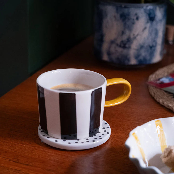 Caroline Gardner Mono Big Stripe Mug featuring bold black and white horizontal stripes, perfect for gifting or everyday use.