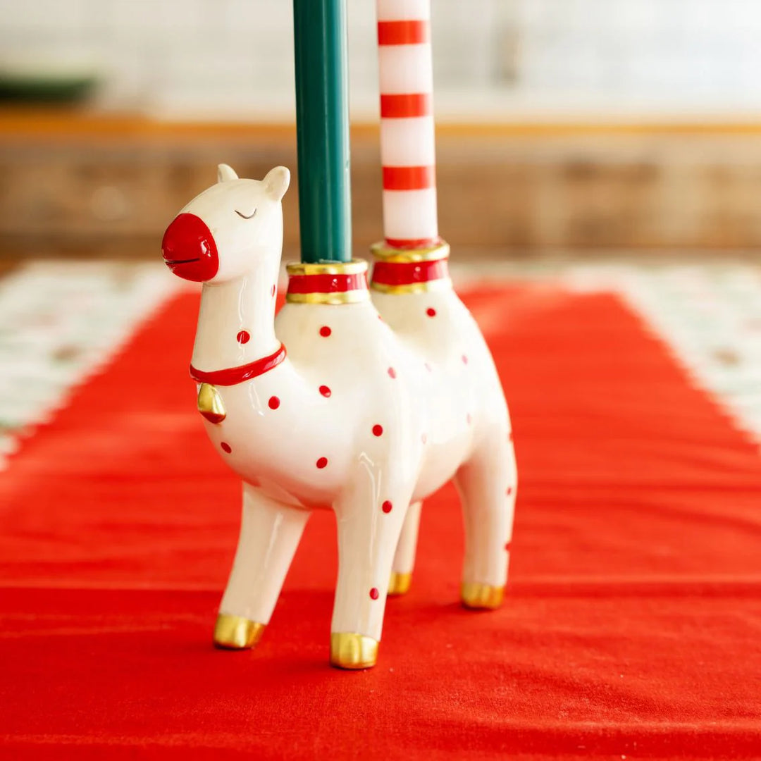 Clancy the Camel Candle Holder by Talking Tables Christmas, crafted by Cornucopia Home and Gift, featuring a decorative camel design.