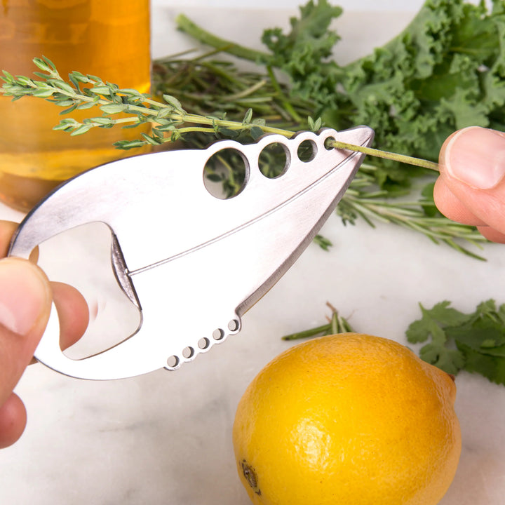 Kikkerland Herb Multi Tool by Cornucopia Home and Gift, showing a compact kitchen herb and spice preparation tool.