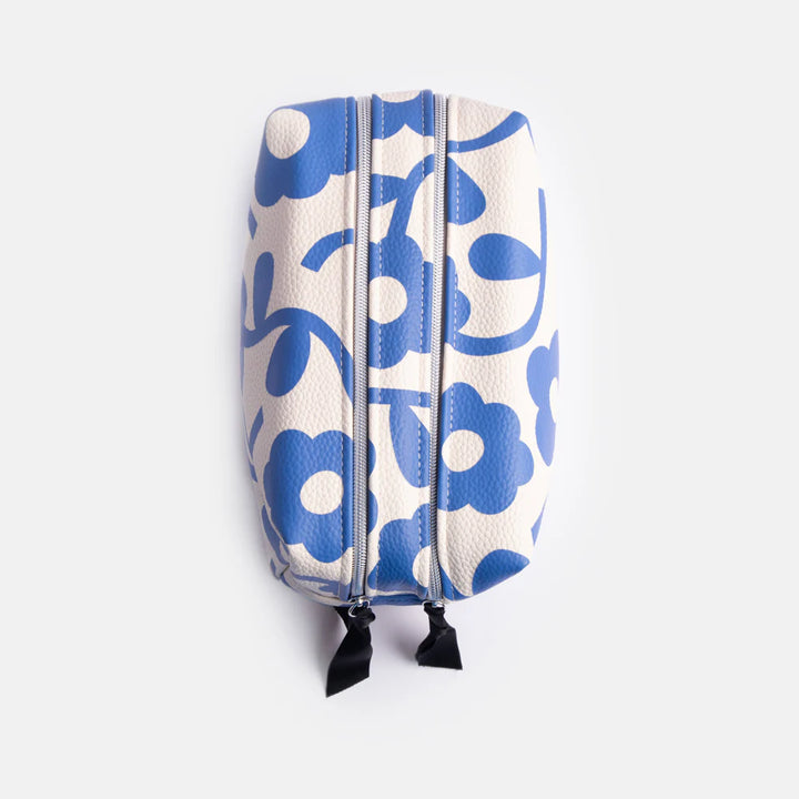 Caroline Gardner Blue Mono Flower large cube washbag with floral design, ideal for travel and organization.