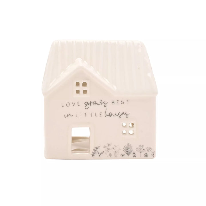 Ceramic house-shaped tea light holder by Widdop &amp; Co from Cornucopia Home and Gift, designed to hold a small tea light candle.