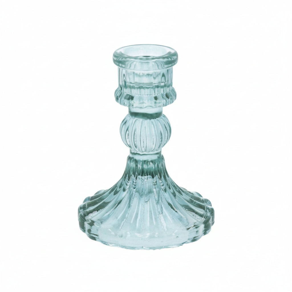 Clear glass candle holder on a white background