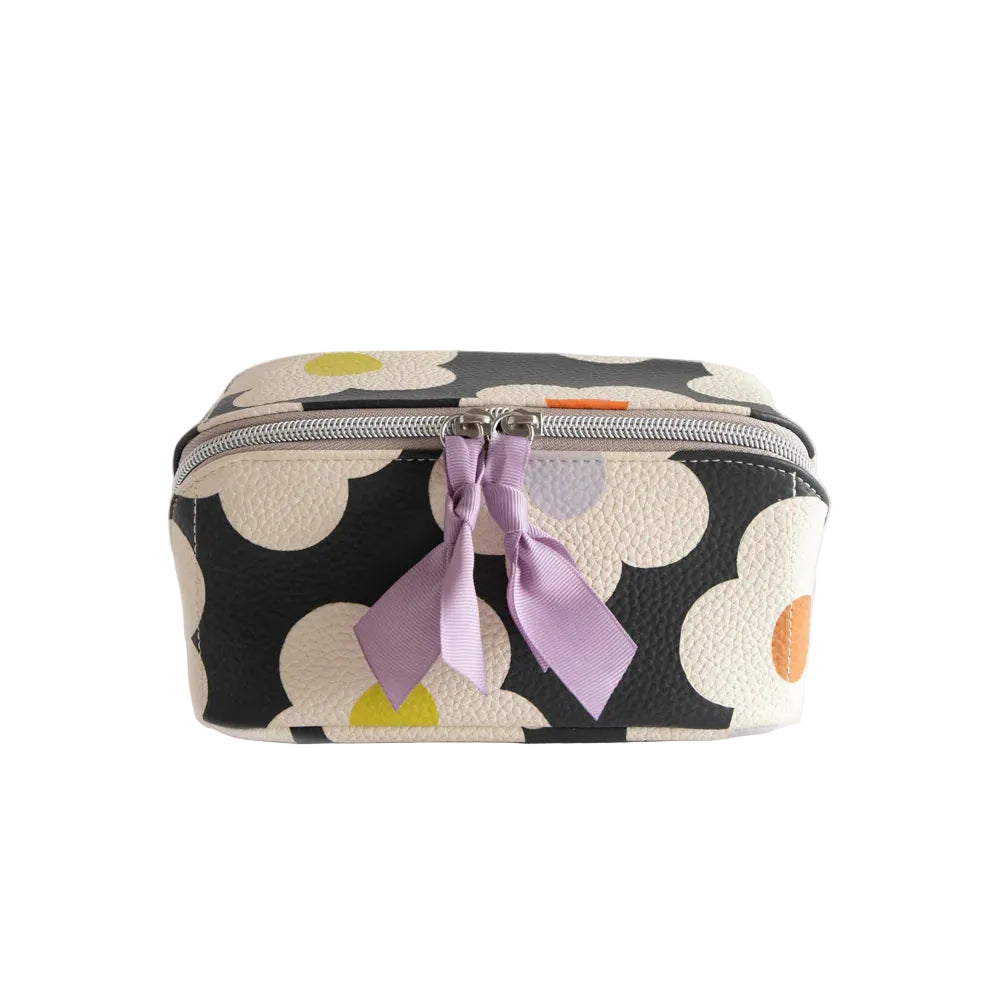 Caroline Gardner multi-flower charcoal diagonal cosmetic bag with floral pattern, ideal for travel and makeup storage.