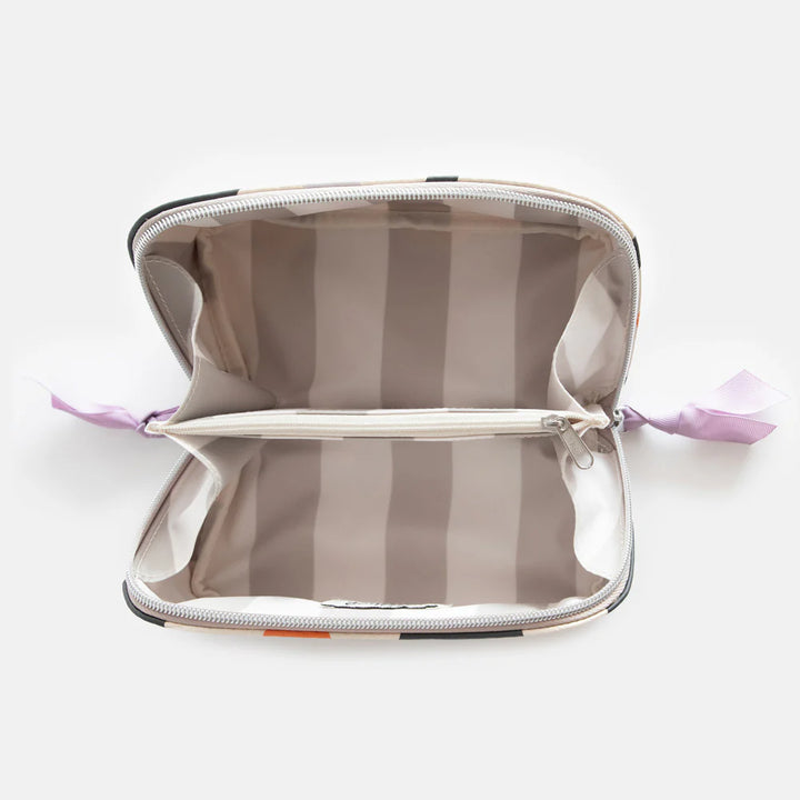 Caroline Gardner multi-flower charcoal diagonal cosmetic bag with floral pattern, ideal for travel and makeup storage.