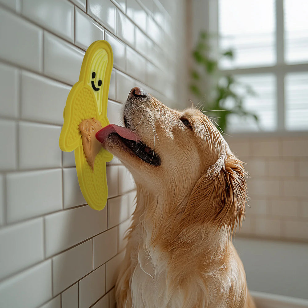 Kikkerland Banana Lick Mat by Cornucopia Home and Gift, shown in a lifestyle setting with the mat and playful banana design.