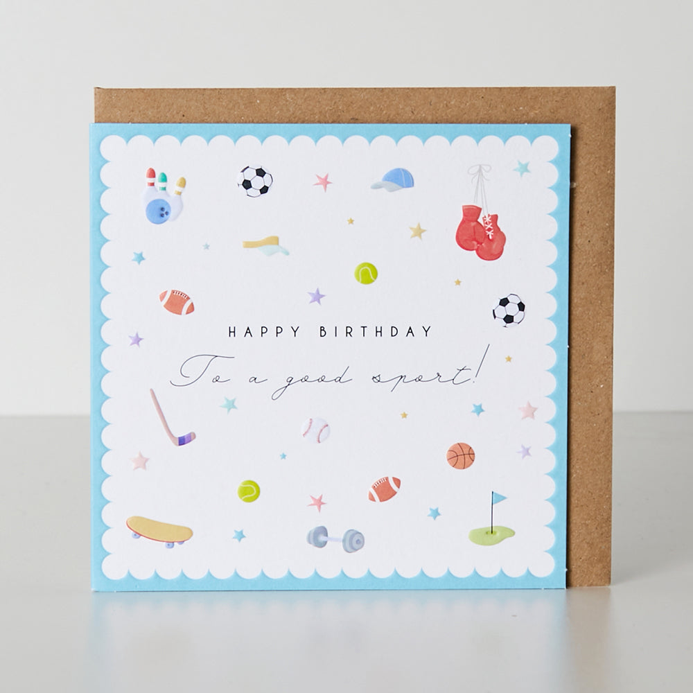 Birthday card featuring a playful belly button design from Cornucopia Home and Gift, with colorful and whimsical artwork.