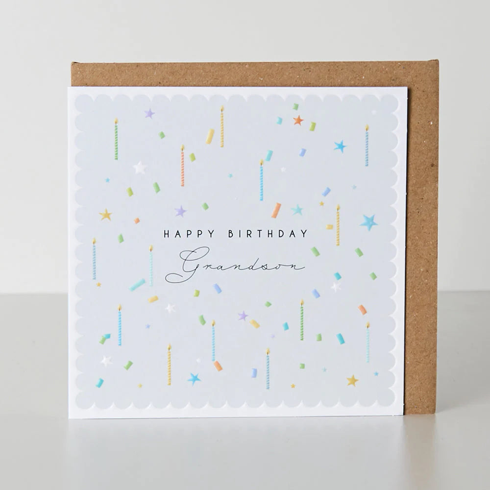 Belly button-shaped birthday card for grandson from Cornucopia Home and Gift, featuring colorful festive design.