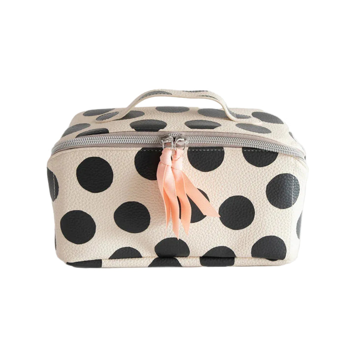 Caroline Gardner large diagonal washbag with scattered dot pattern, ideal for travel and gift-giving, in vibrant colors.