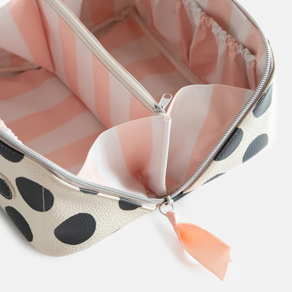 Caroline Gardner Scattered Dot Large Diagonal Washbag with colorful polka dot pattern and zip closure, ideal for travel or organization.