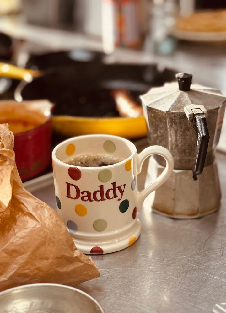 Emma Bridgewater polka dot Daddy 1/2 pint mug with colorful polka dot design on white ceramic.