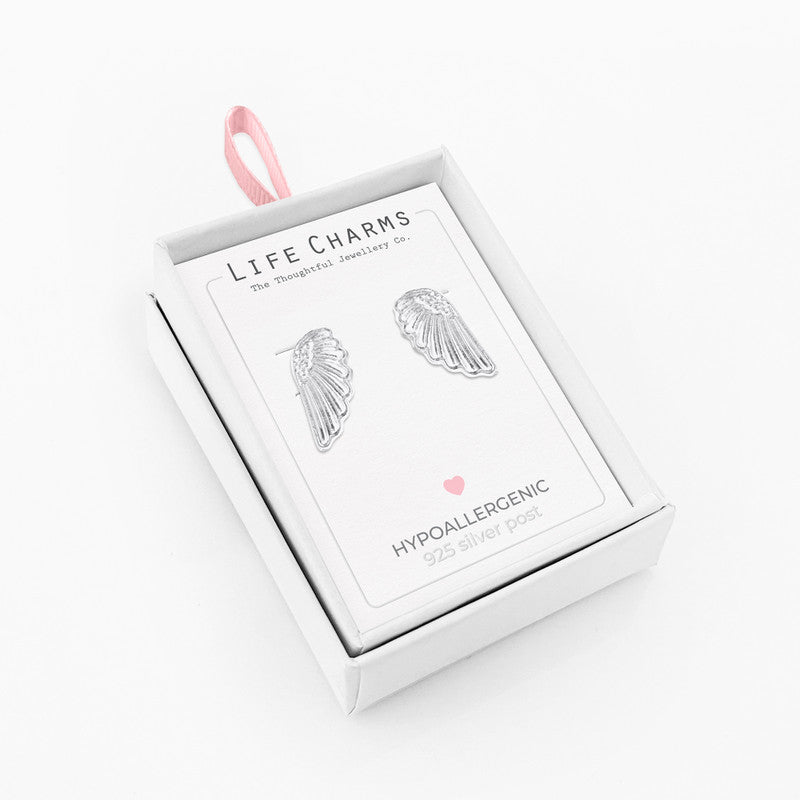 Silver angel wing stud earrings from Cornucopia Home and Gift, featuring delicate life charms design.