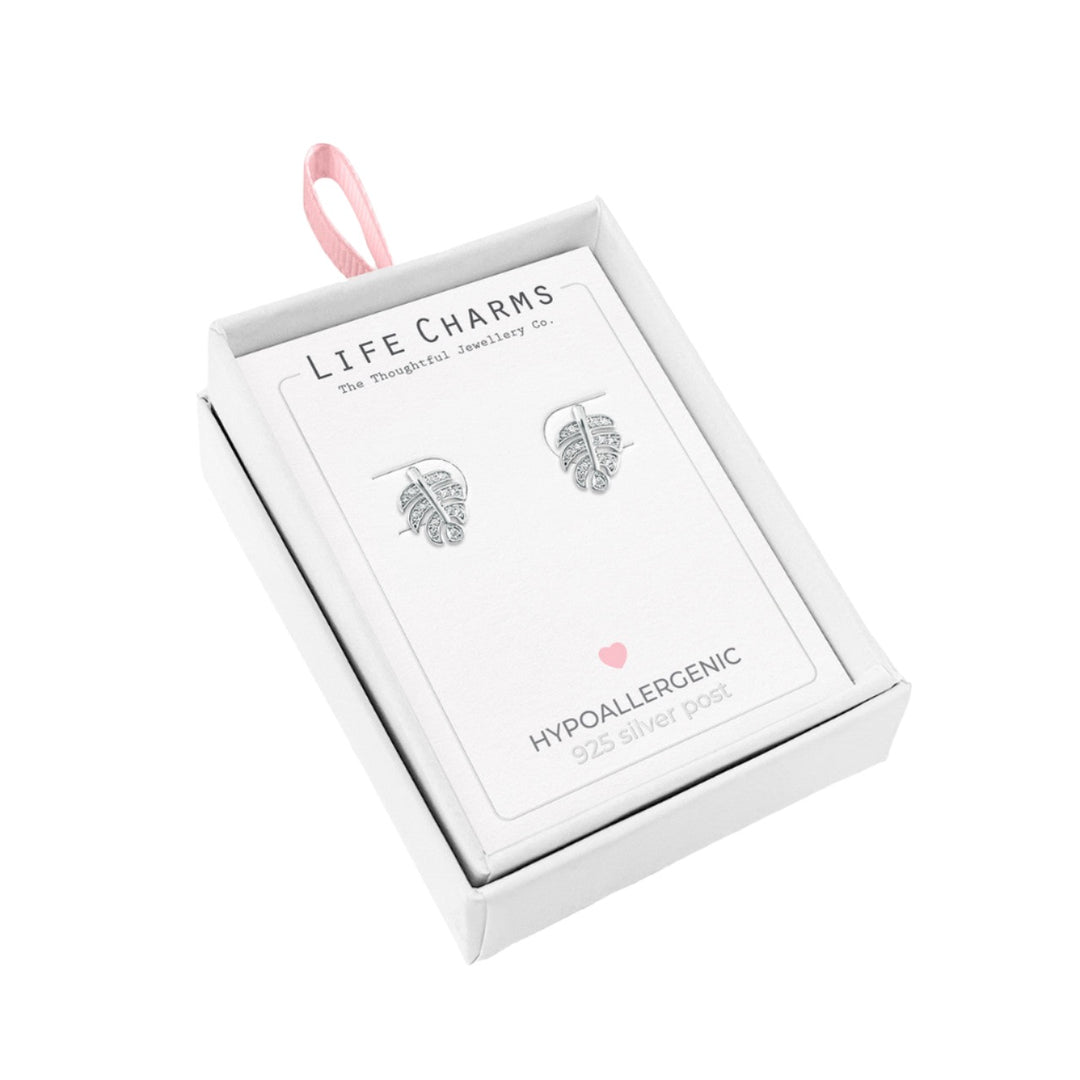Silver palm leaf stud earrings by Life Charms, featuring intricate leaf design, from Cornucopia Home and Gift.