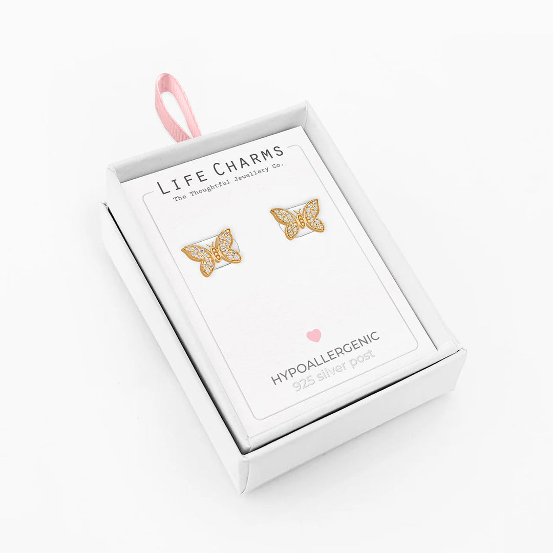 Gold butterfly stud earrings from Life Charms by Cornucopia Home and Gift, featuring delicate butterfly designs on a white background.