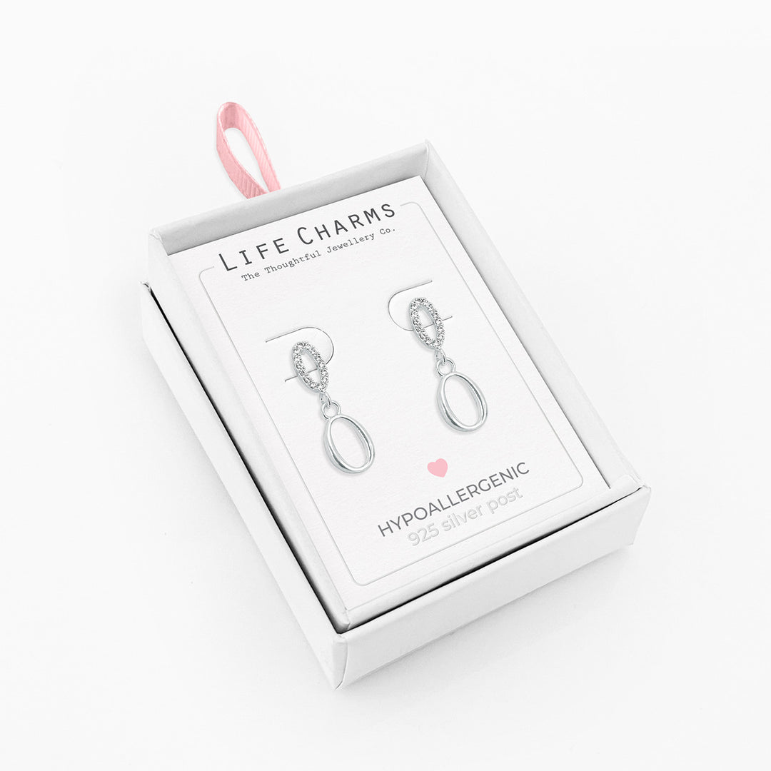 Silver drops stud earrings from Life Charms by Cornucopia Home and Gift, showcasing elegant, shiny silver jewelry with a drop design.