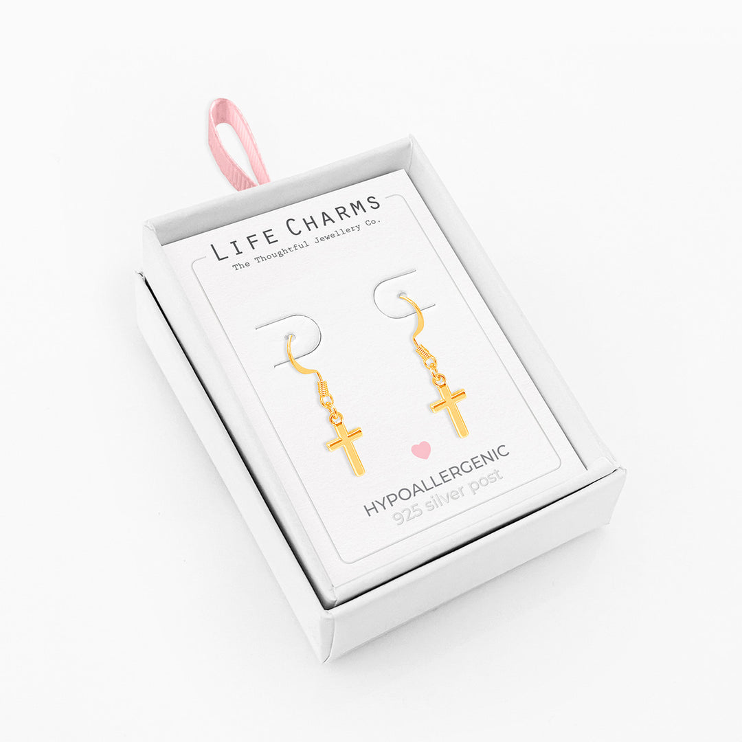 Gold cross drop earrings from Life Charms by Cornucopia Home and Gift, featuring elegant gold crosses on delicate drop earrings.