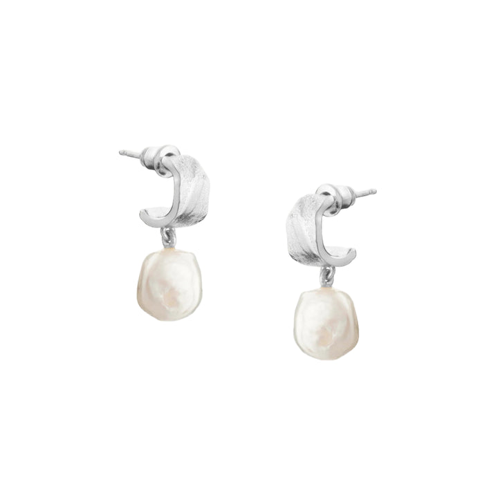 Silver freshwater pearl earrings by Tutti &amp; Co featuring elegant, lustrous pearls on a delicate silver setting.