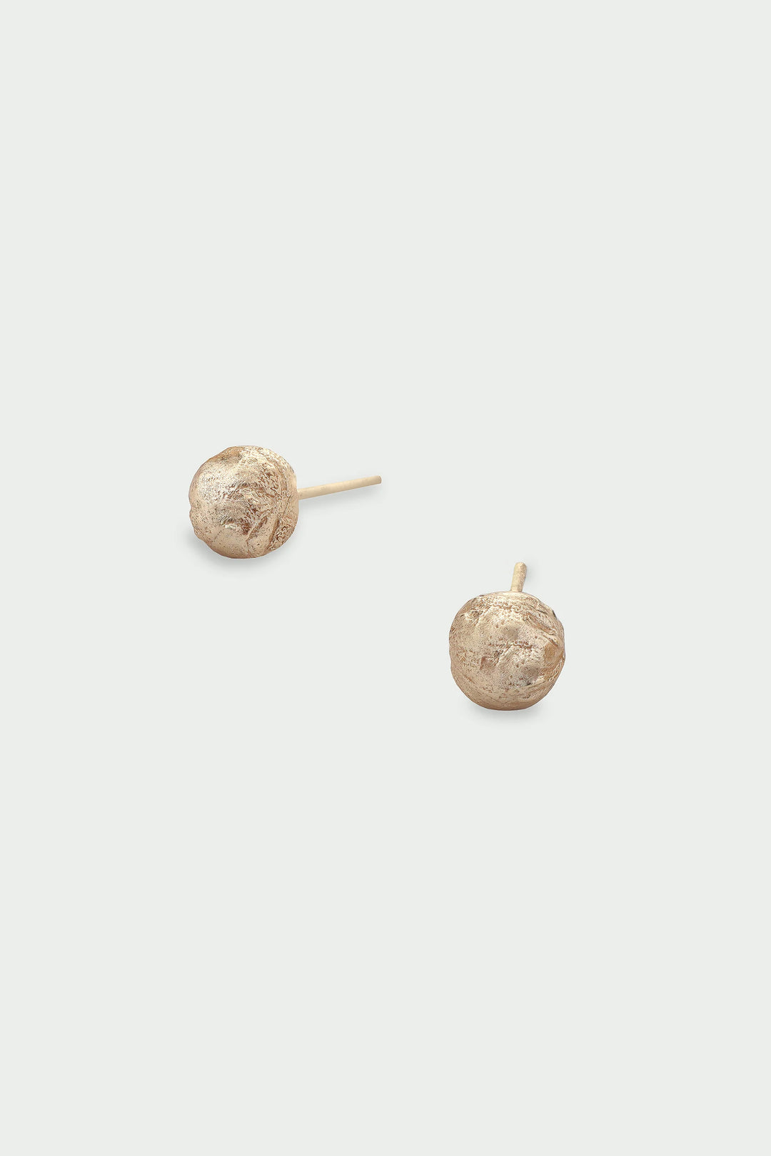 Tutti &amp; Co Sphera Earrings with spherical design, featuring gold-tone finish, displayed on a neutral background.