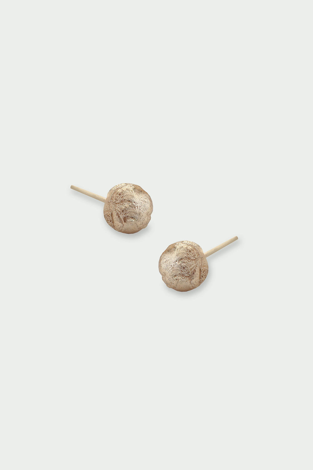 Tutti & Co Sphera earrings with sleek, spherical design in a polished metal finish, displayed on a plain background