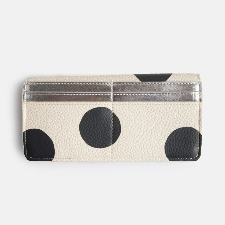 Caroline Gardner Spot Long Envelope Purse featuring a colorful polka dot pattern and a sleek, slim design for essentials.