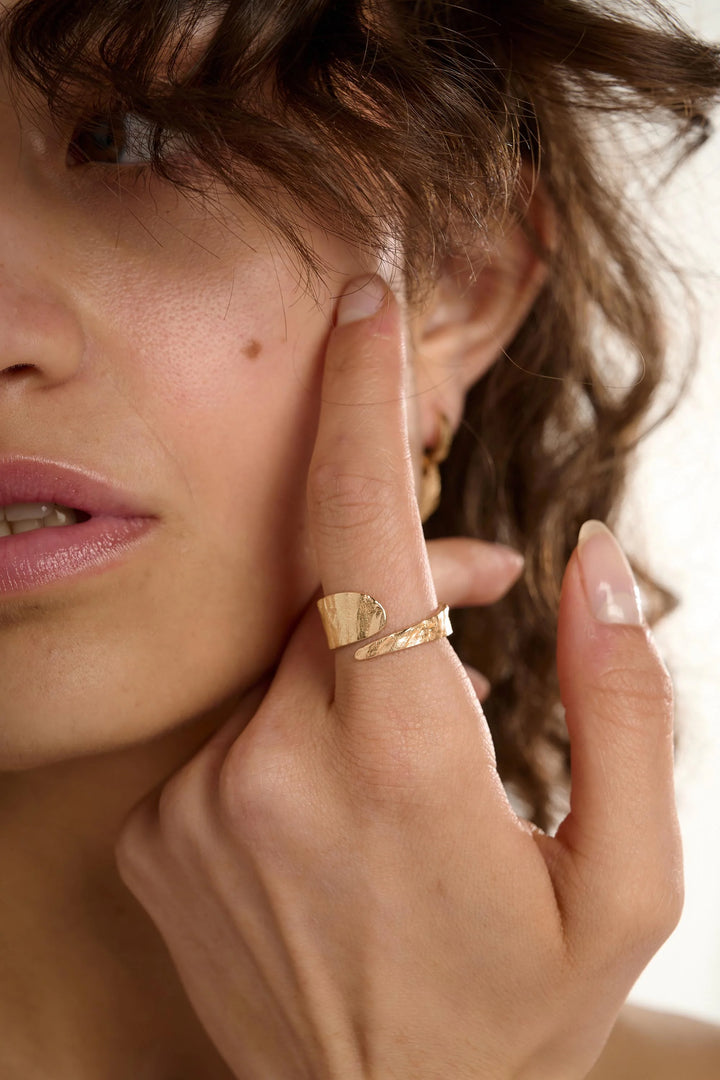 Gold Riva Ring by Tutti &amp; Co from Cornucopia Home and Gift, featuring a sleek, modern design with a smooth, rounded shape.